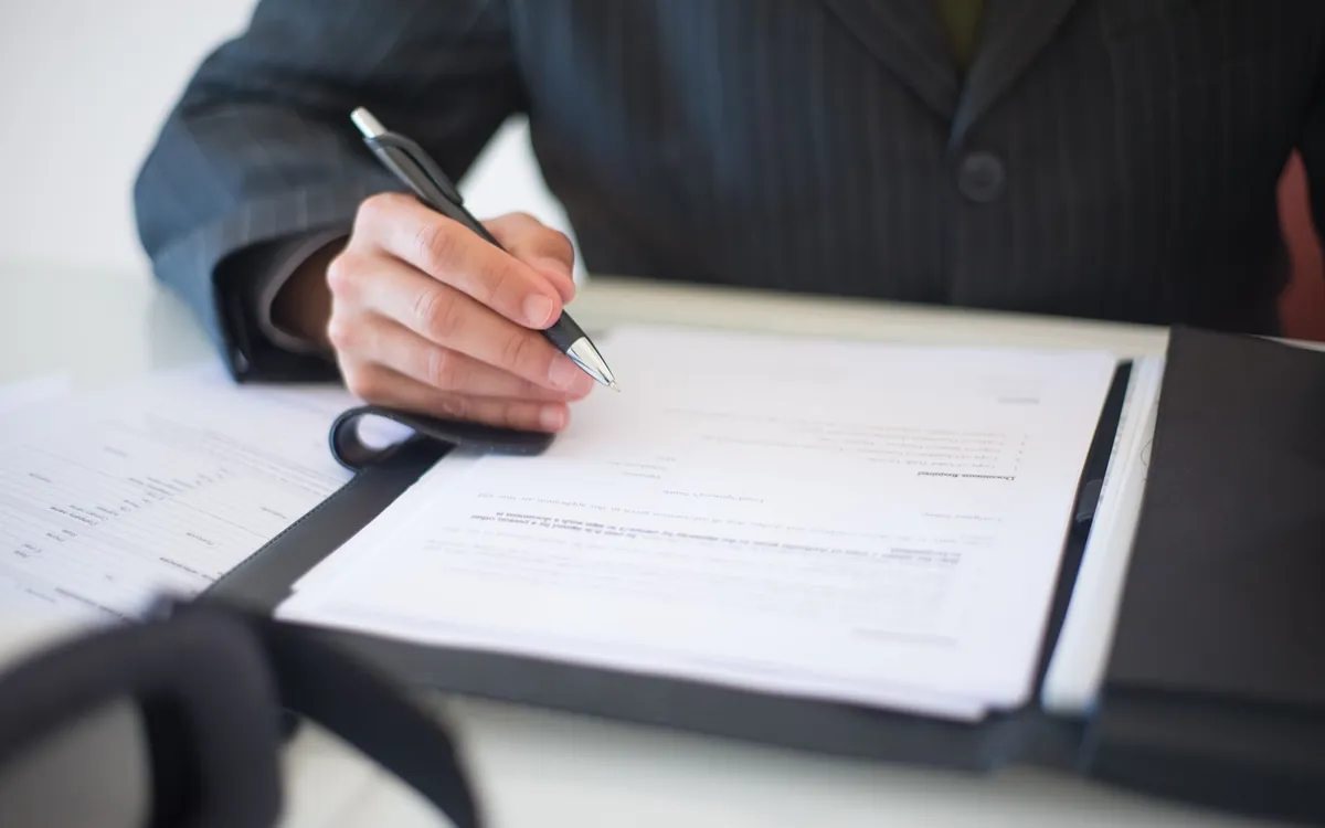 Mortgage loan disclosure documents on a desk