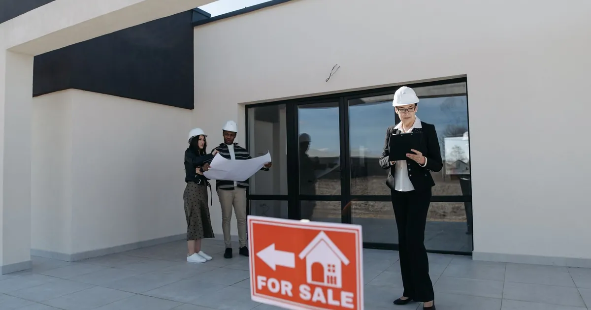 Real estate agent meeting with clients